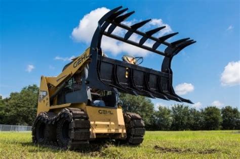 using a skid steer with bucket to clear land|best mower for clearing land.